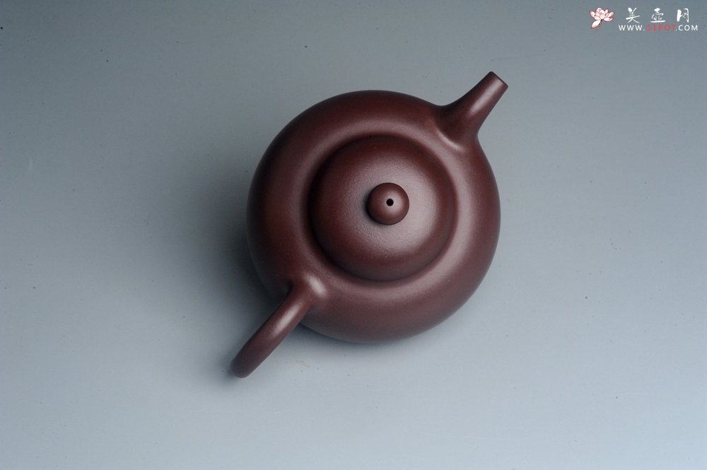 紫砂壶图片：潜力股周小培老师 原创全手工底槽青圆掇壶 - 全手工紫砂壶网