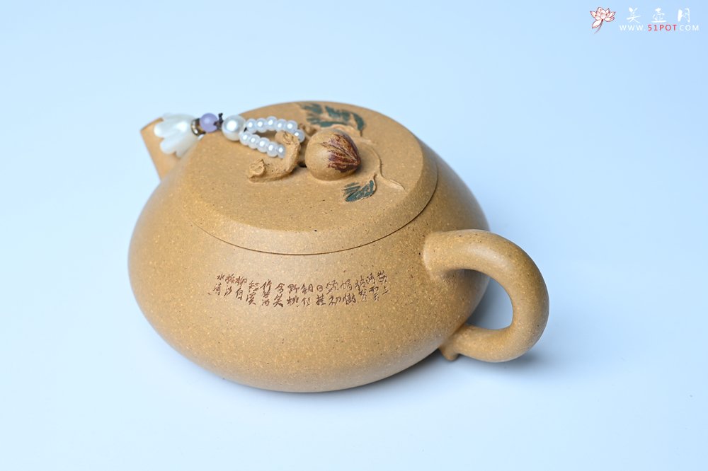 紫砂壶图片：美壶特惠 特好黄龙山段泥香桃壶 桃和叶特灵动 仿生佳作 - 全手工紫砂壶网